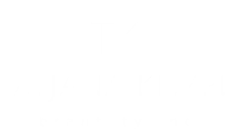 Das Logo des Friseursalons "stylebar by Tatjana Kempf" in Münsingen in Weiß.